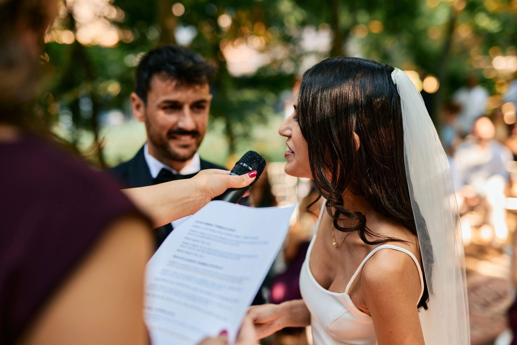 bride and groom exchanging vows